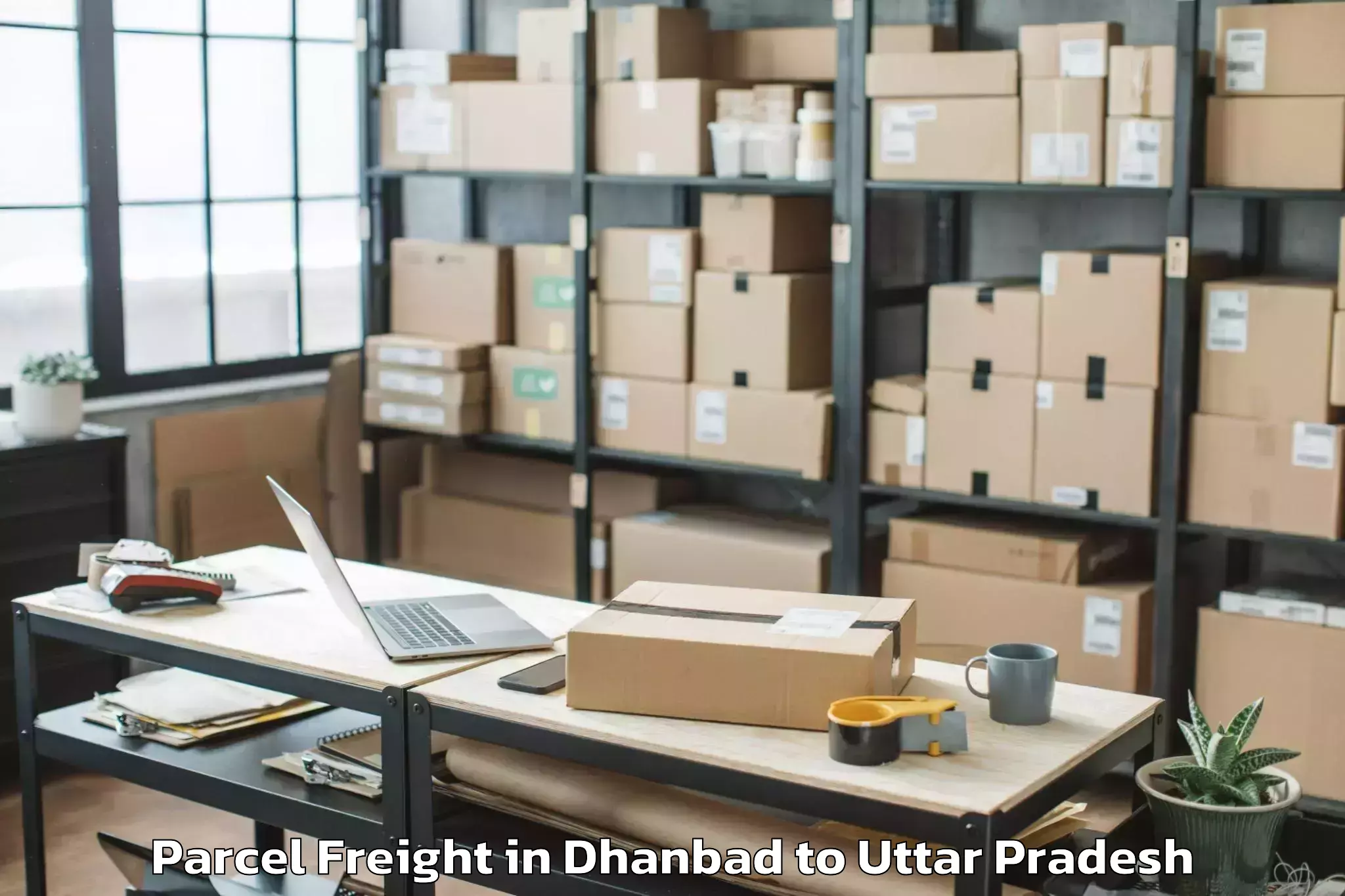 Dhanbad to Gahmar Parcel Freight Booking